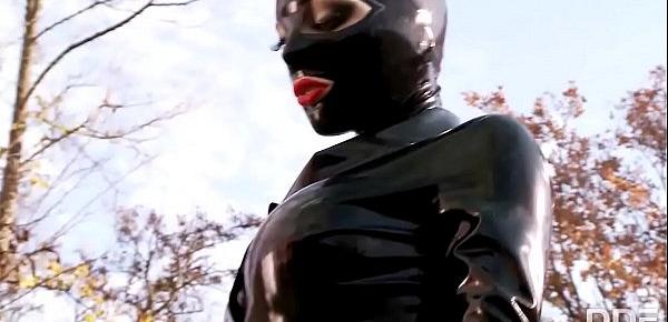  Fetish Queen Latex Lucy Fucks herself outdoors with Dildo